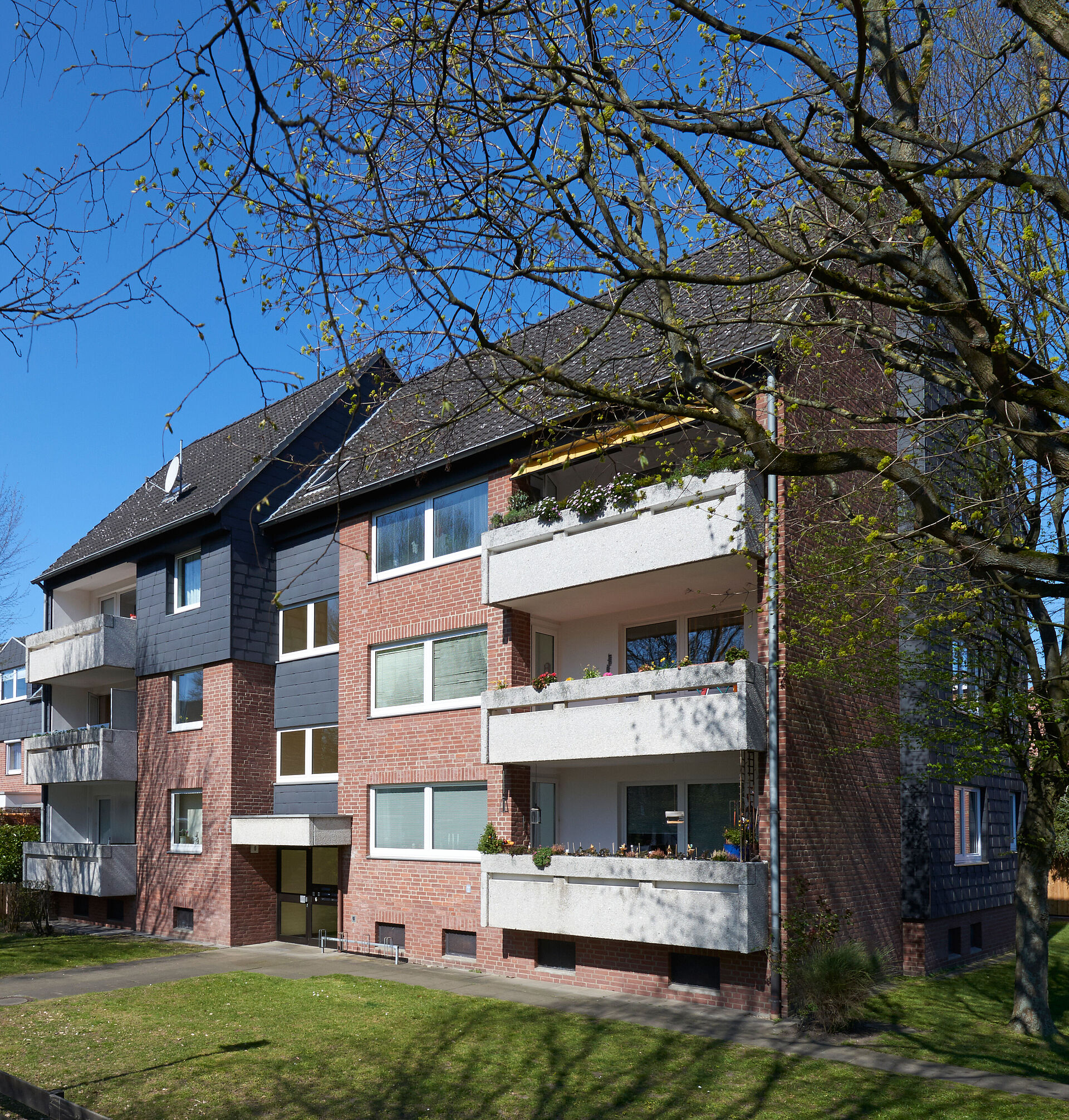 Bilder eines Mehrfamilienhauses im Brelinger Hof